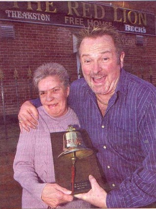 Barmaid Betty Brockhurst, pictured with co-owner Jeremy Shaw, says goodbye